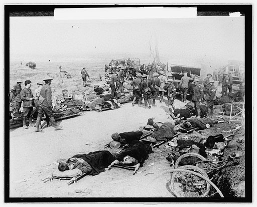 Casualties on stretchers, Red Cross