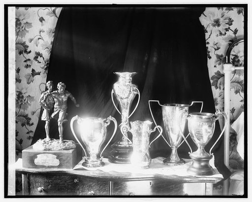Wash. Cross Club trophies