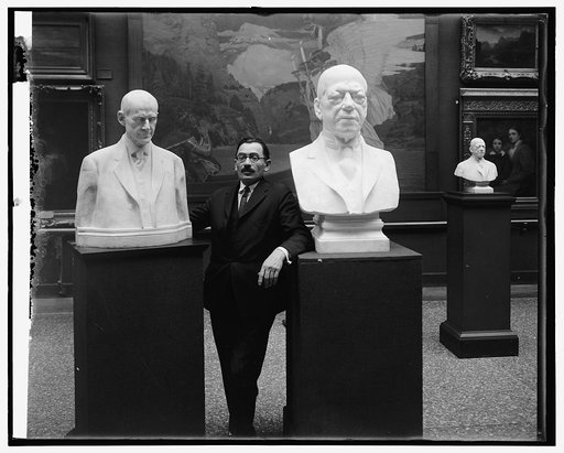 Dykaar with busts of Pres. at National Gallery, [Washington, D.C.
