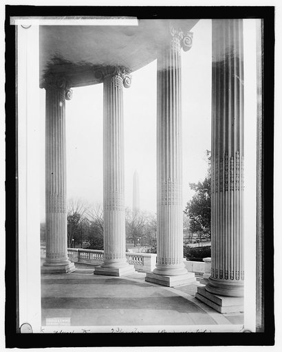 Monument thru colonnades of D.A.R., [Washington, D.C.