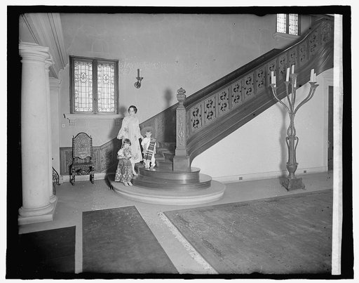 Mexican Embassy, [Washington, D.C.]; Emilia & Jose Telley on staircase