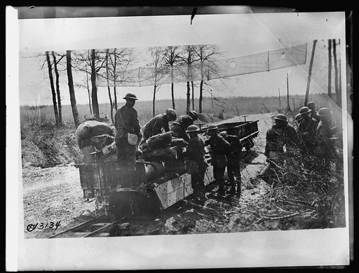U.S. Army unloading Quartermaster] stoves at front