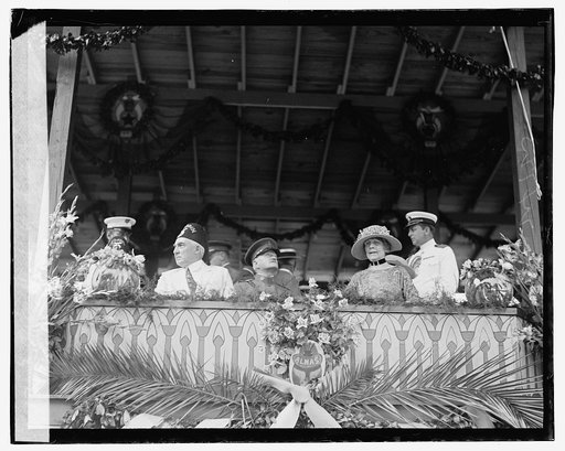 Shriners Parade, Washington, D.C.] President, Gen'l Pershing, Mrs. Harding receiving parade