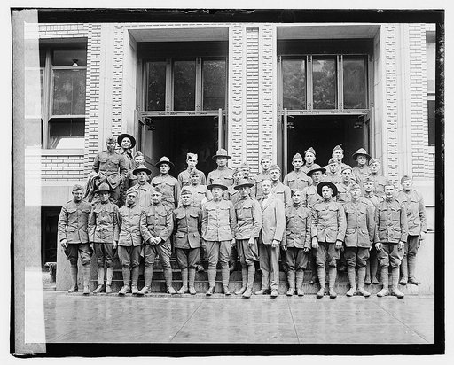 Large group of overseas soldiers who applied for Naturalization, June 6, 1919. Man in center is Raymond Crist, Director of Citizenship, Bureau of Naturalization, Department of Labor