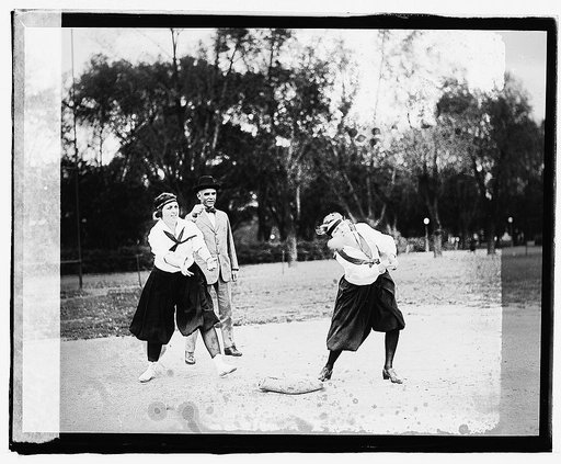 Lucile Boyd catching; Mary Cook at bat