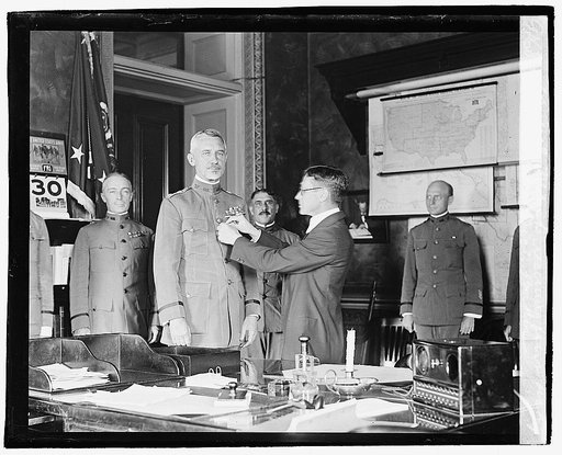 General March receiving first victory medal from Secty. Baker