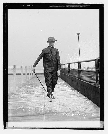 Ertle[?] in paper suit