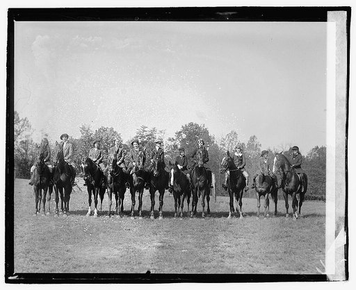 Line of girls on horseback