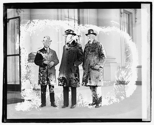 Three men standing outside building], 12/6/20