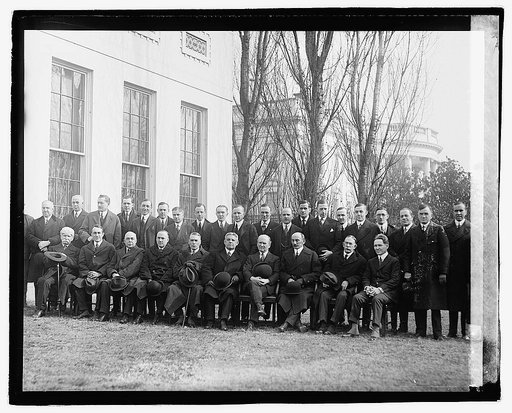 Group newspaper men at White House