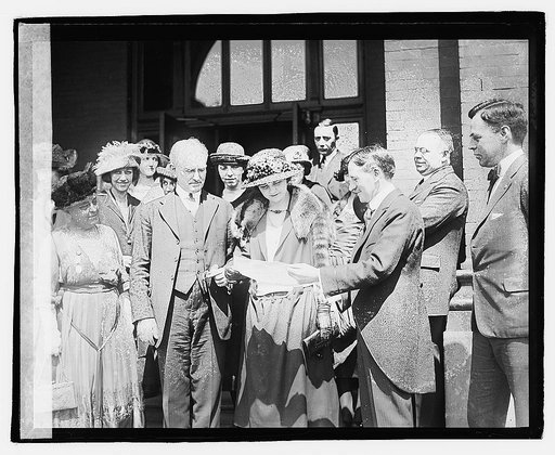 Catherine Butterfield with group of unidentified people,] 4/3/21