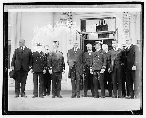 Harding with group outside building], 4/14/21