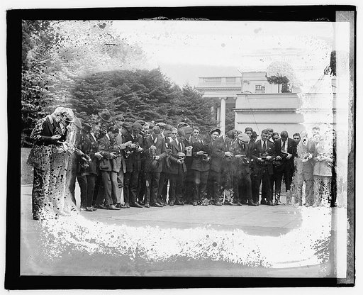 Group of men with cameras], 4/28/21