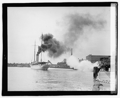 Presidential yacht Mayflower with billowing smoke