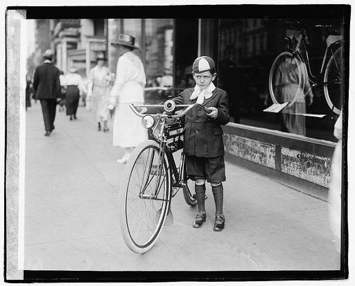 Times boy on bicycle