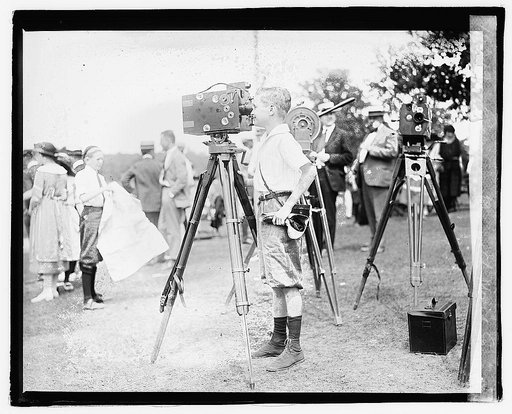Edwards boy with movie cameras