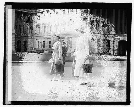 Unidentified women carrying broomes and pails], 9/8/21 suff.