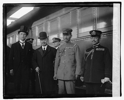 Admil. Kato & Maj. Gen'l K. Tanaka and two unidentified men next to train], 10/24/21