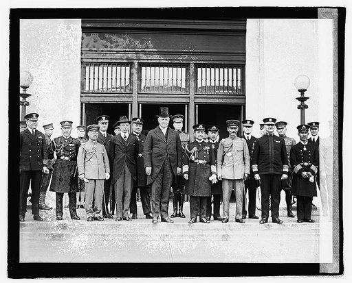 Admil. Kato & Maj. Gen'l. K. Tanaka and group outside building], 10/24/21