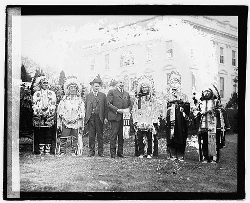 Harding with group of Native Americans at White House], 11/16/21