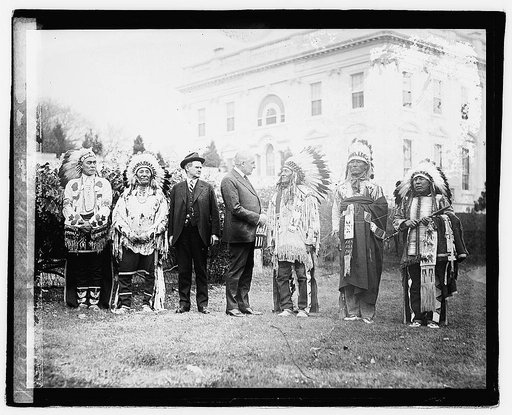 Harding with group of Native Americans at White House], 11/16/21