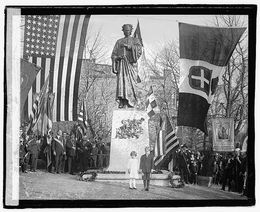 The Dante Statue, unveiled in Meridian Park, Wash., D.C., today. It is the gift of Chevalier Carlo Bersotti, a prominent Italian citizen of New York. The children of Col. Sherrill, Military Aide to the President, who unveiled the statue are shown in the foreground 12/1/21