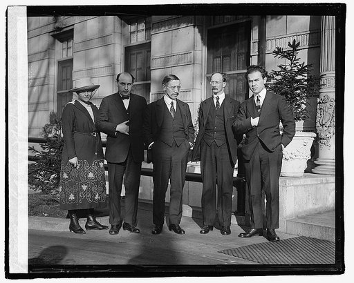 A deputation from the far eastern Republic of Chita, formerly a part of Russia, who are in Washington to secure the voice of the arms conference in demanding that Japan withdraw her troops from Siberia. Reading from left to right the members of the deputation are: Mme. L. Skvirsky, B.E. Skvirsky, fo