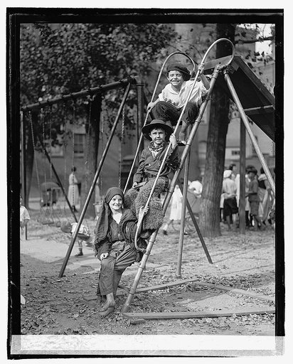 Children in costume on steps of sliding board], 9/7/22
