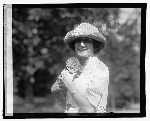 Mlle. Antoine Geoffrion [& lion cub