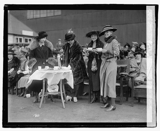 Bolling Field Air Circus, October 25, 1922 - Left to right, Mrs. Talcott Smith, Mrs. George Reinburg, Mrs. Bandholtz and Mrs. Patrick enjoy a hot lunch dropped from an airplane] 10/25/22