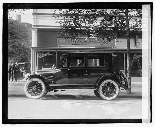 Black in Oldsmobile