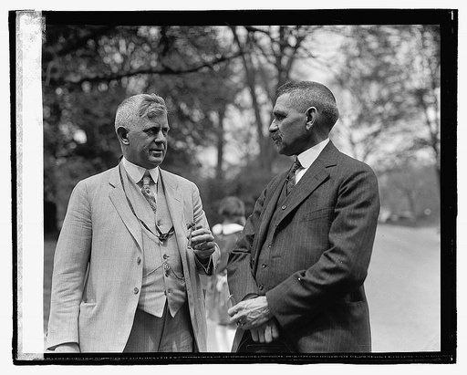 Dr. Clifford N. Collins (left)