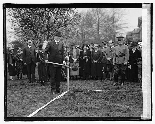 Herbert Hoover breaking ground for model house