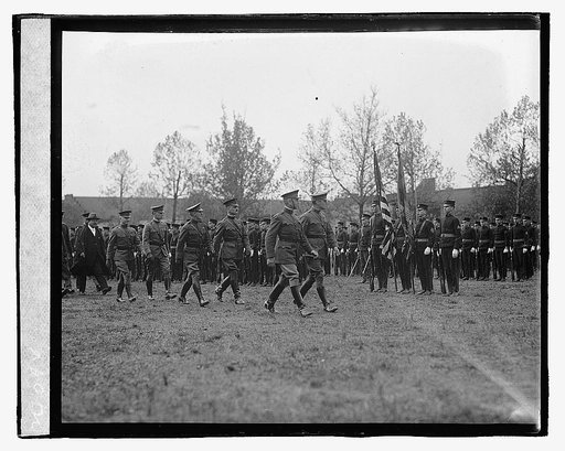 Unidentified uniformed men participating in ceremony