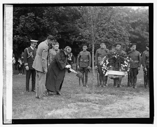 Mrs. Harding planting tree, 5/30/1923