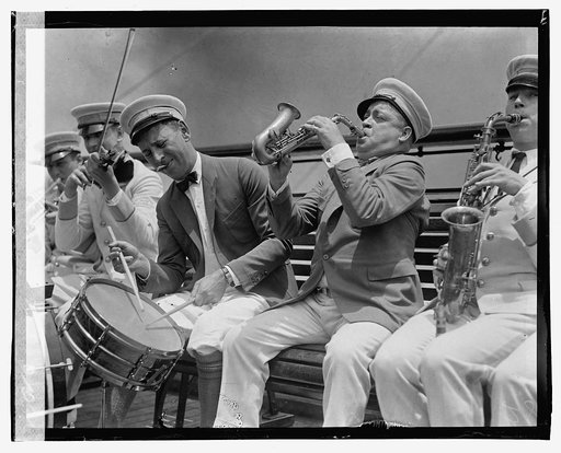 Military band members playing instruments