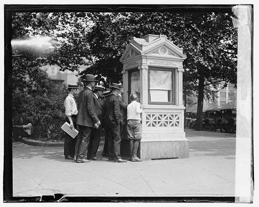 Group outside U.S. Weather bureau kiosk