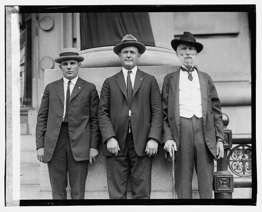 Three unidentified men