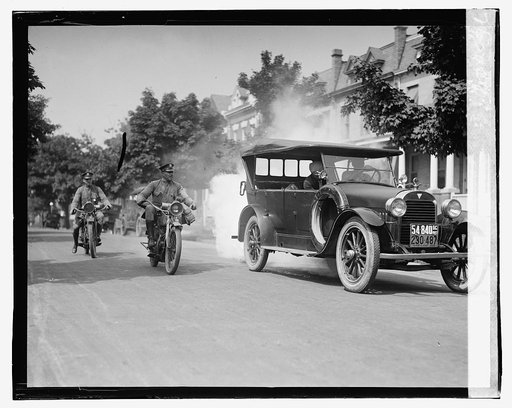 Police on motorcycles trailing car with smoke], 9/1/23