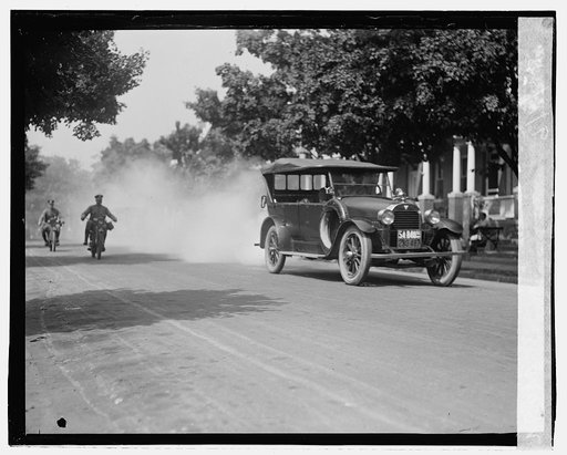 Police on motorcycle trailing car with smoke], 9/1/23