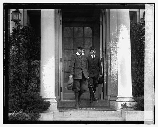 Two boys leaving building, Wilson funeral(?)