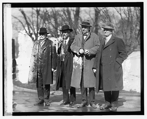 Col. Cameron with unidentified men], 2/20/24