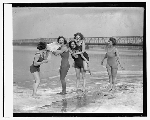 Five women in swimsuits on icy beach], 2/23/24