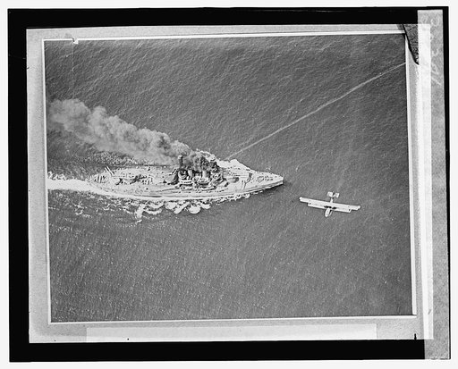 Wake of torpedo showing a hit. Photographic plane passin[g] ahead of U.S.S. Oklahoma [crossed out] Arkansas