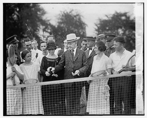 Pres. & Mrs. Coolidge on tennis courts of monument grds., 7/31/24