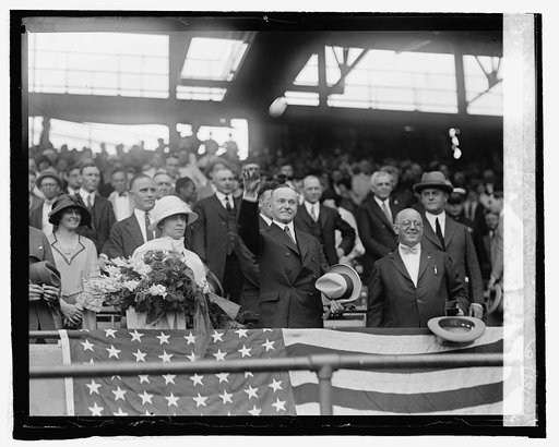 Coolidge throwing out ball at Police-Firemen's benefit ball game, 9/13/24