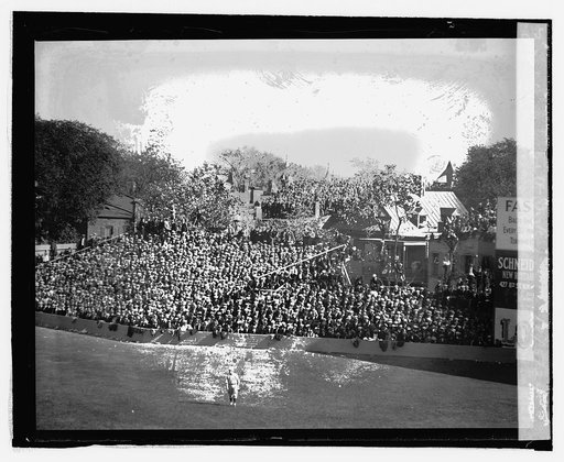Temporary bleachers and crowds at ball park, 10/5/24