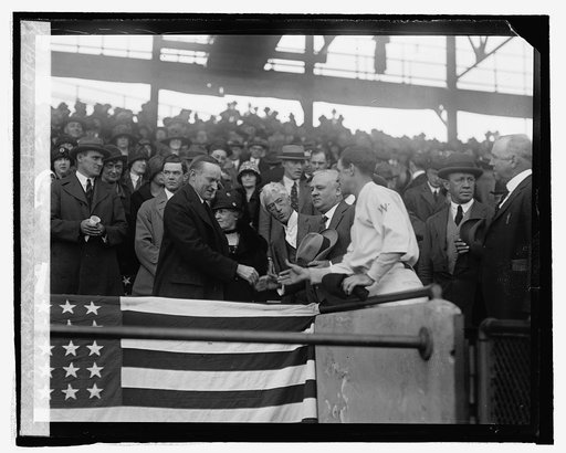 Pres. Coolidge shakes hands with J. McGraw & S. Harris, 10/9/24