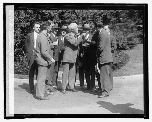 Judge K.M. Landis with newspaper men at W.H.