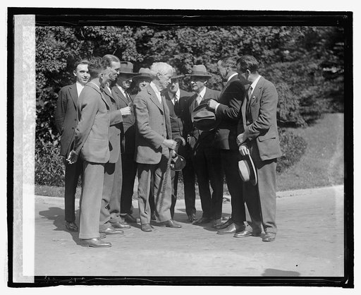 Judge K.M. Landis with newspaper men at W.H.